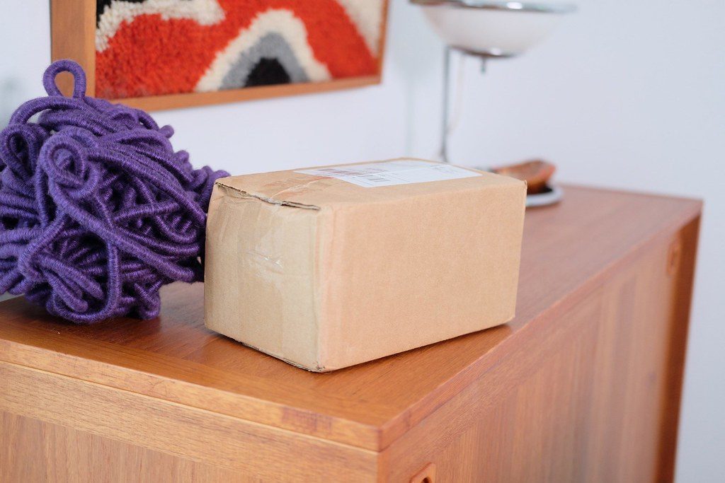 A brown cardboard parcel ready for e-commerce delivery